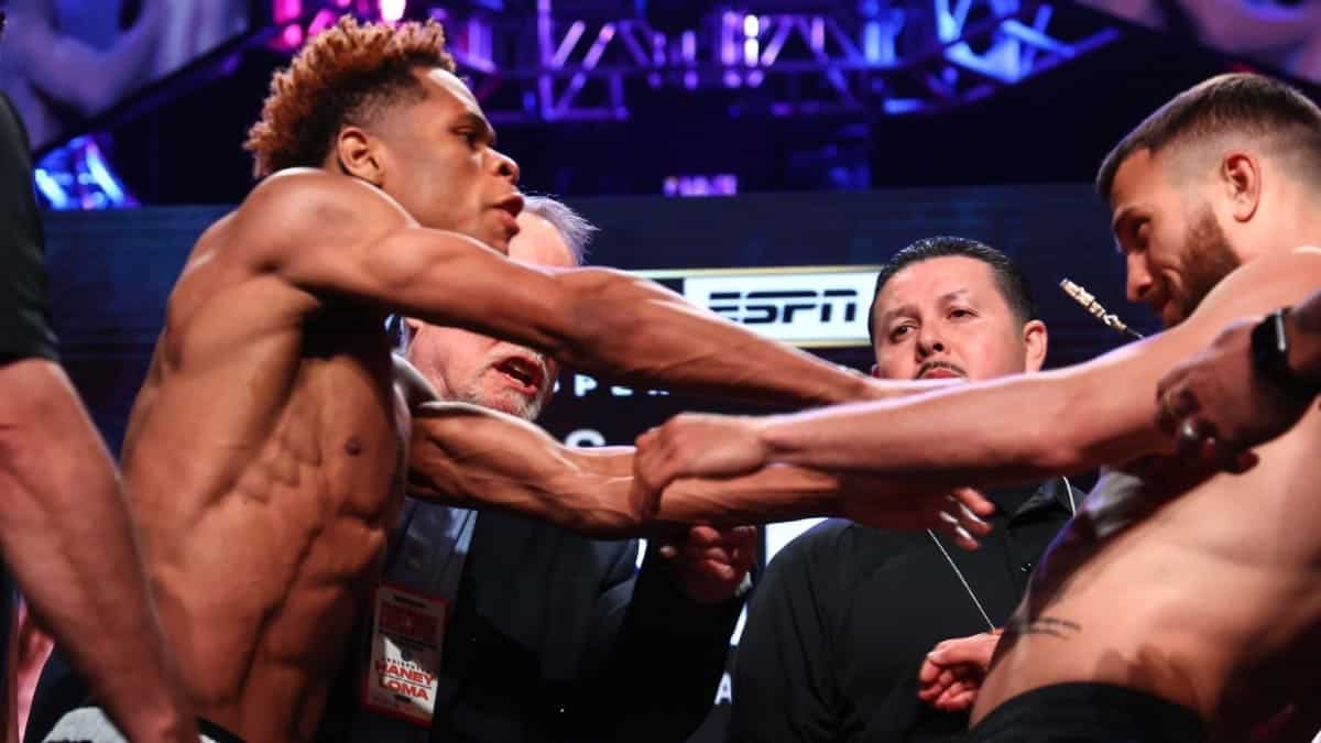 Devin Haney shoves Lomachenko