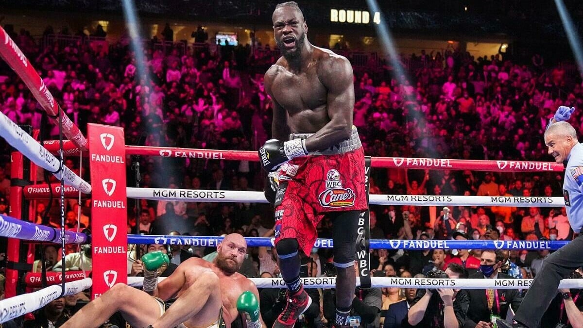 Deontay Wilder knocks down Tyson Fury