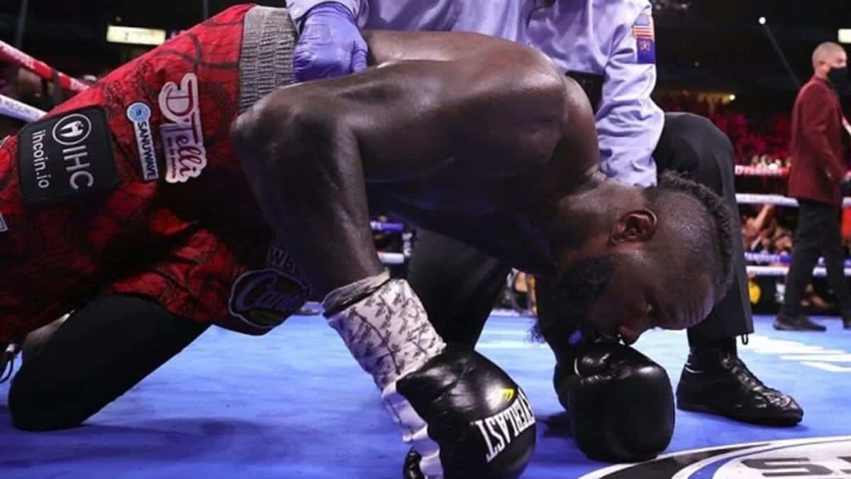 Deontay Wilder laid out on the canvas