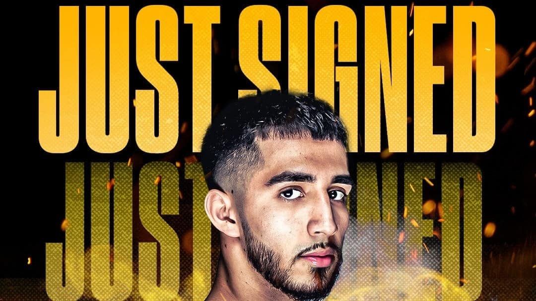 Oscar De La Hoya signs 17-time National Champion Joel Iriarte