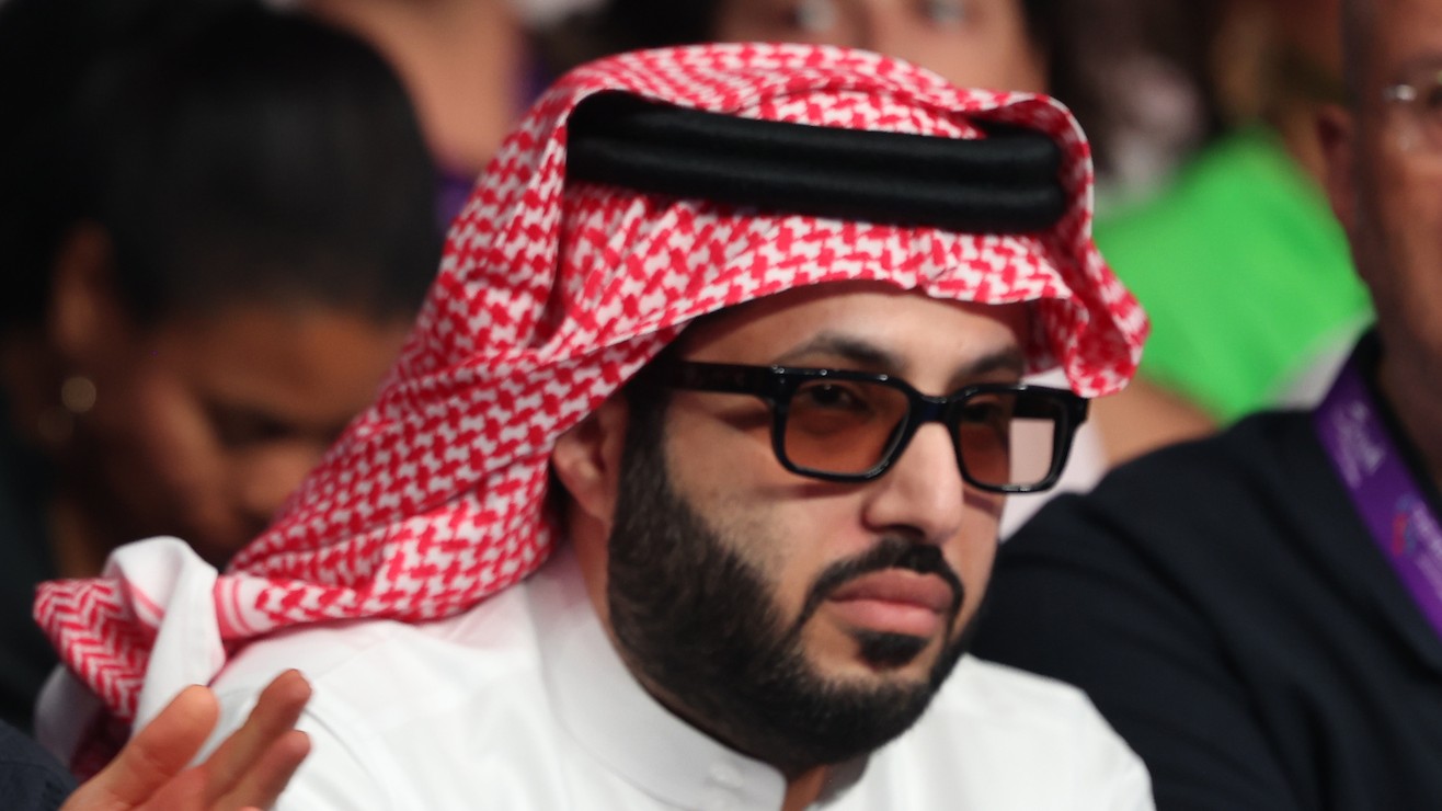 Turki Alalshikh watches a fight in Saudi Arabia