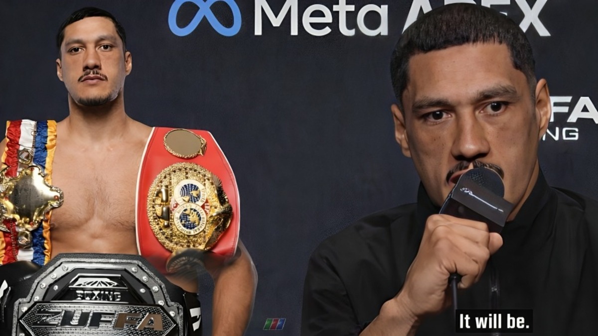 Jai Opetaia speaks at a press conference as the Zuffa championship belt and his former IBF title are shown
