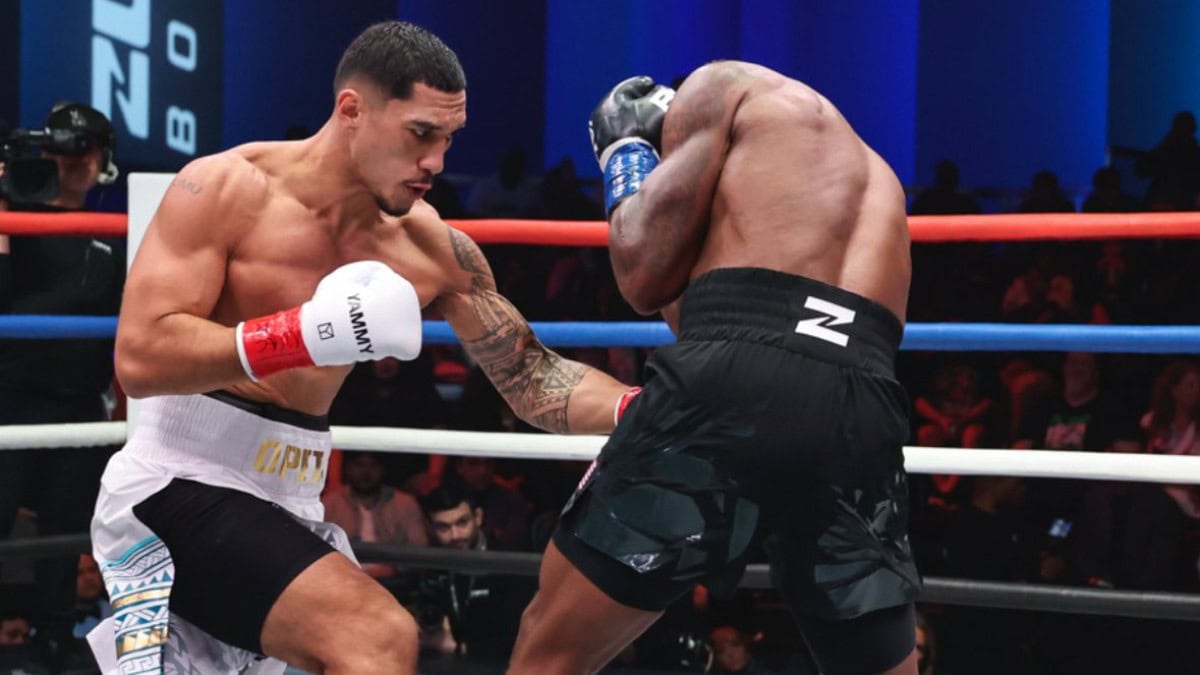 Jai Opetaia lands a body shot against Brandon Glanton during their Zuffa Boxing cruiserweight bout in Las Vegas.
