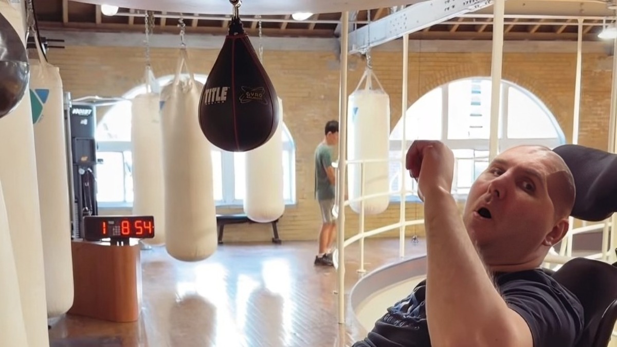 Magomed Abdusalamov smiling and gesturing during a training clip shared by his wife Bakanay Abdusalamova