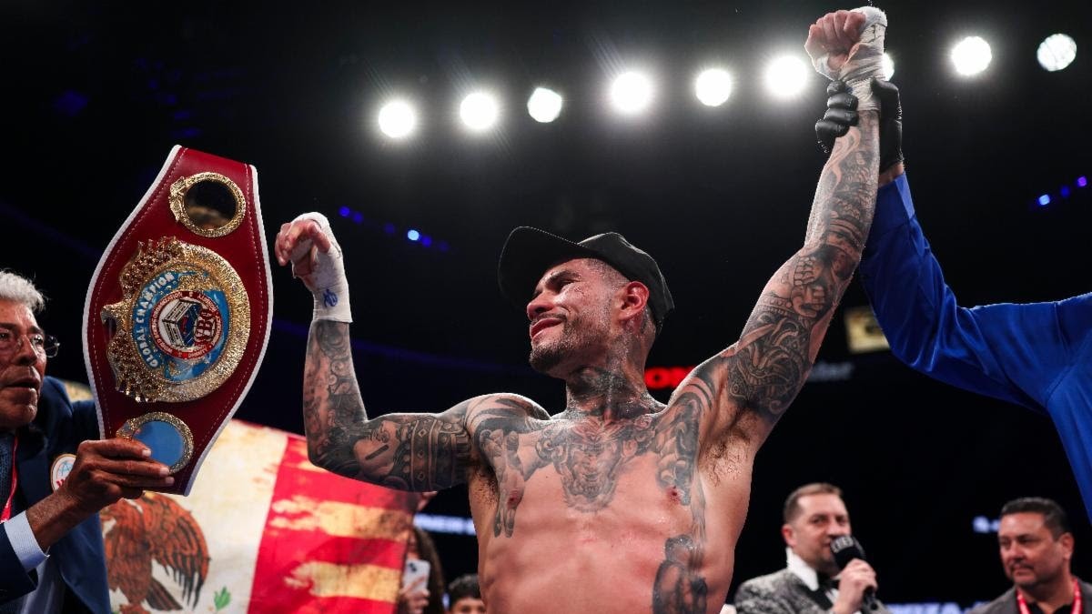 Arnold Barboza Jr celebrates victory over Kenneth Sims Jr at the Honda Center in Anaheim