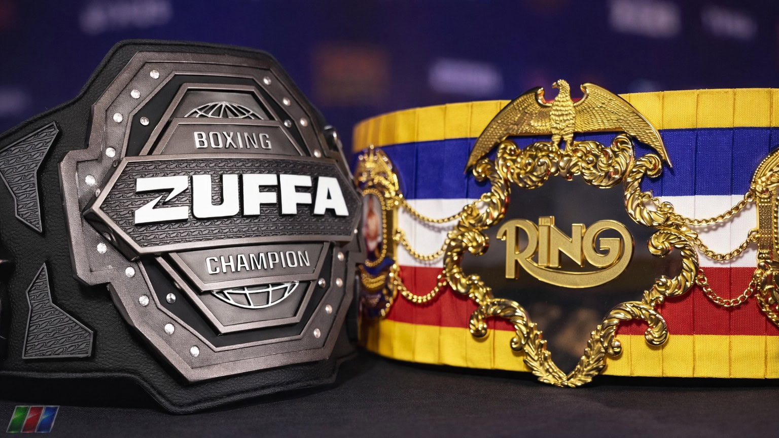 Zuffa Boxing belt alongside The Ring championship belt comparison
