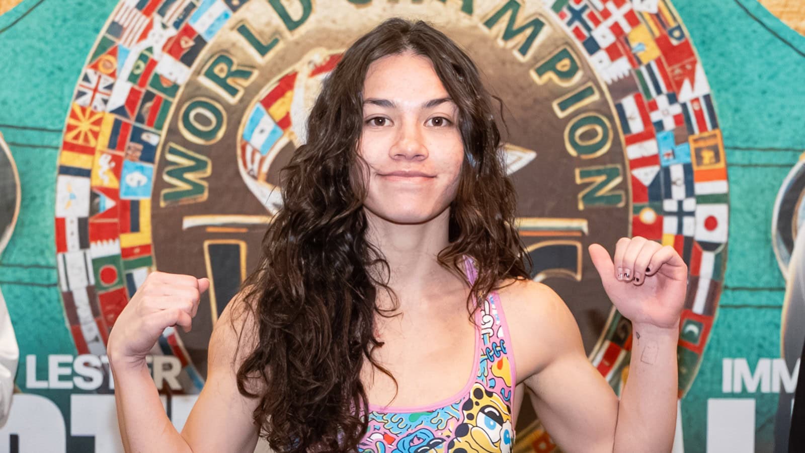 Isis Sio poses at weigh-in ahead of her professional bout in California