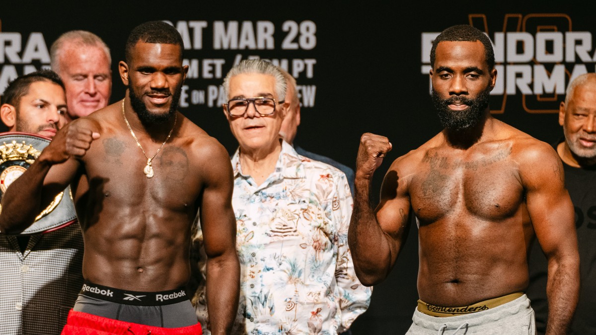 Yoenli Hernandez and Terrell Gausha pose during the weigh-in ahead of the Fundora vs Thurman fight card in Las Vegas