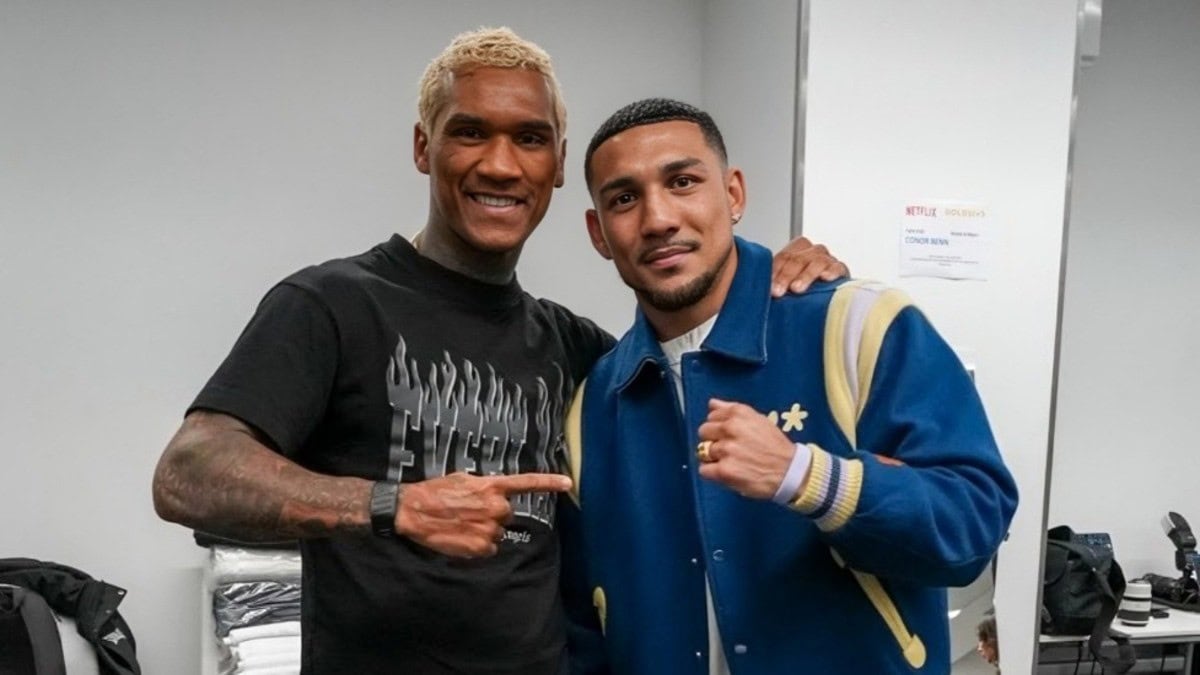 Conor Benn and Teofimo Lopez pose together backstage after boxing event