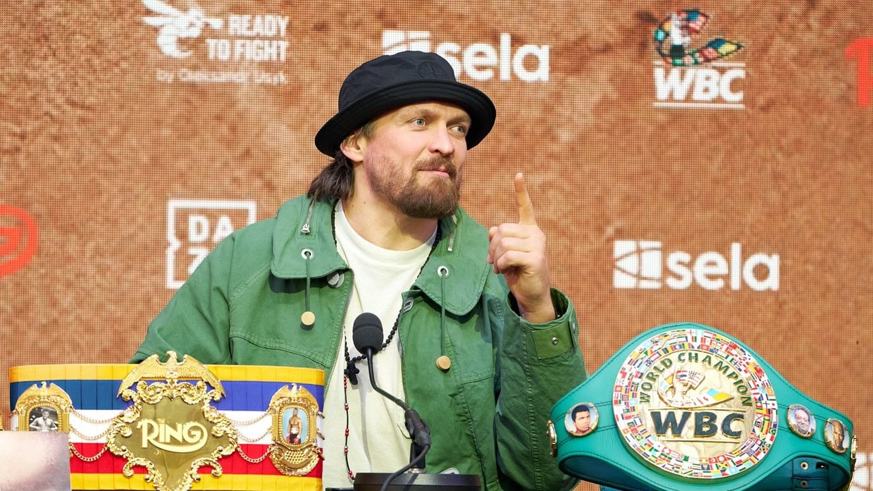 Oleksandr Usyk speaks at a press conference alongside WBC and Ring titles ahead of his fight with Rico Verhoeven in Giza