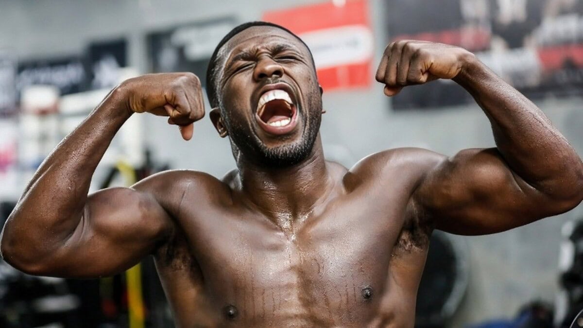 Andre Berto flexes and shouts during intense boxing training session