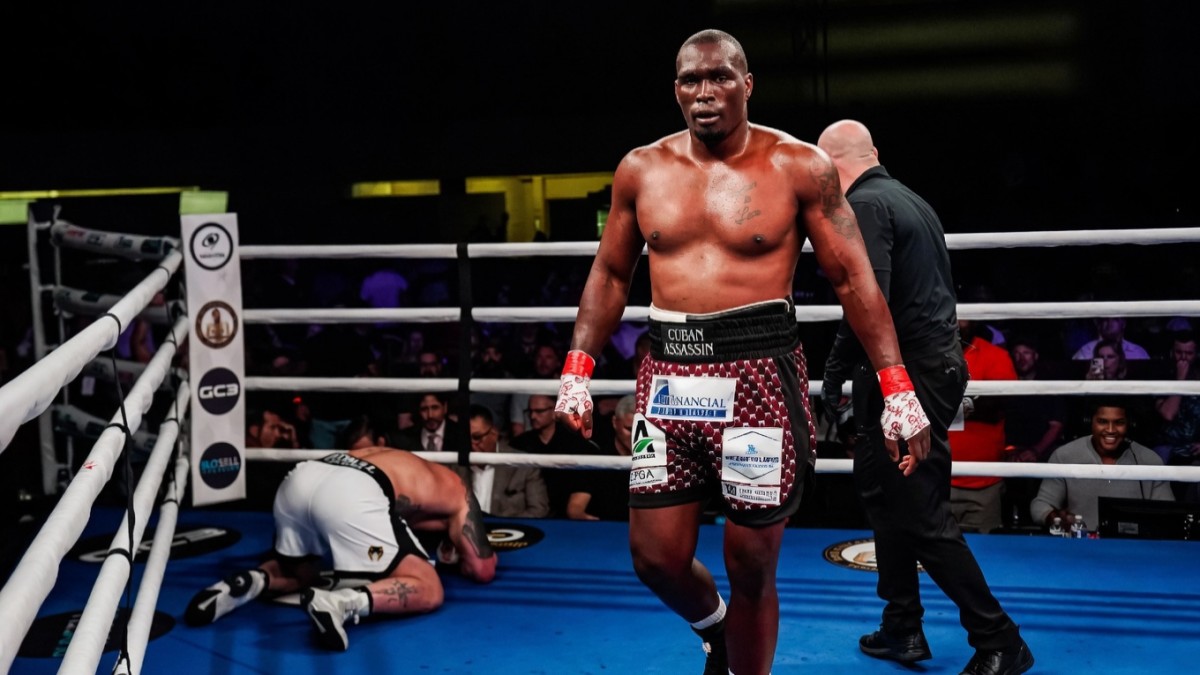 An image of undefeated heavyweight contender Gustavo Trujillo knocking out an opponent