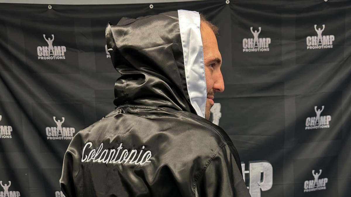 Brandon Colantonio wearing boxing robe with name on back at Champ Promotions event