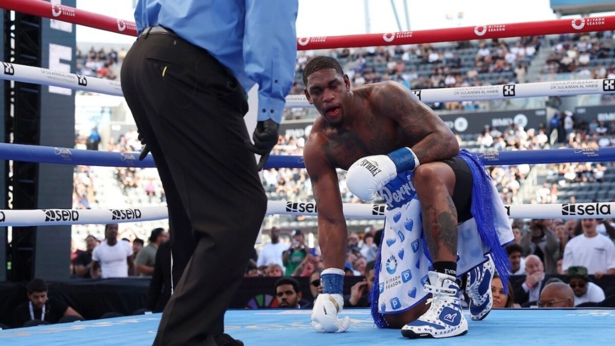 Jared Anderson down on one knee after knockdown during Martin Bakole fight