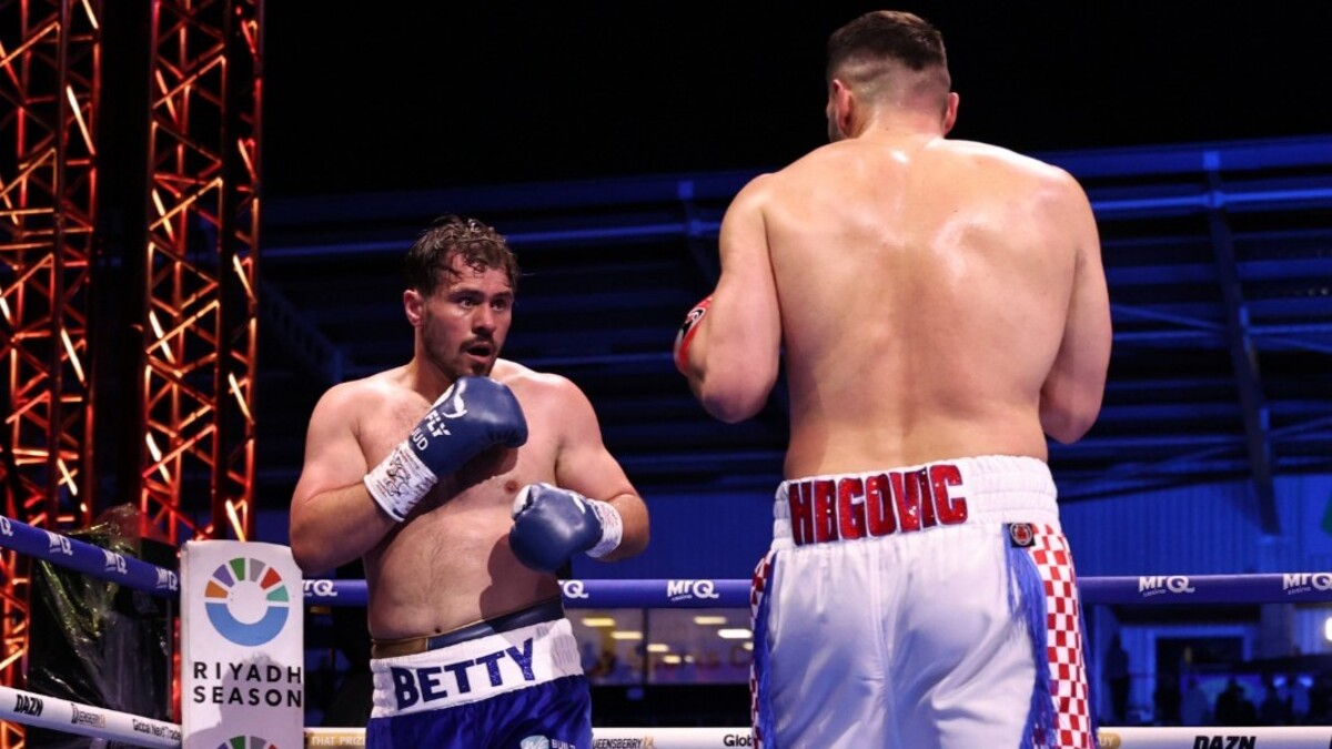 Dave Allen backs away from Filip Hrgovic during their heavyweight fight in Doncaster as the Croatian pressures the Yorkshireman before a third-round stoppage.