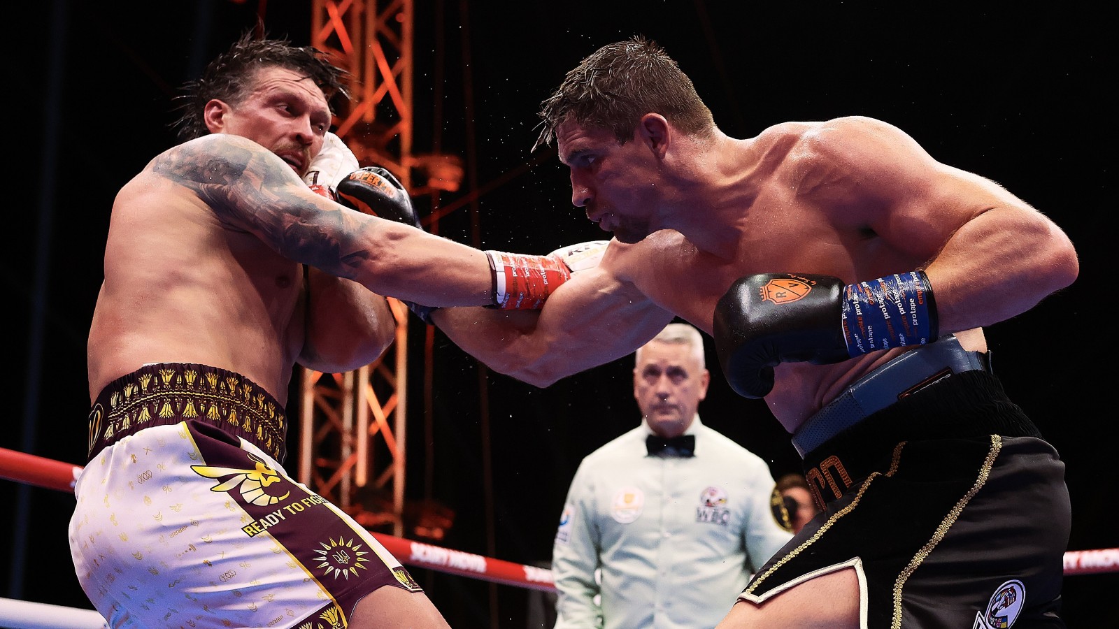 Rico Verhoeven lands a punch on Oleksandr Usyk during their controversial heavyweight title fight in Egypt