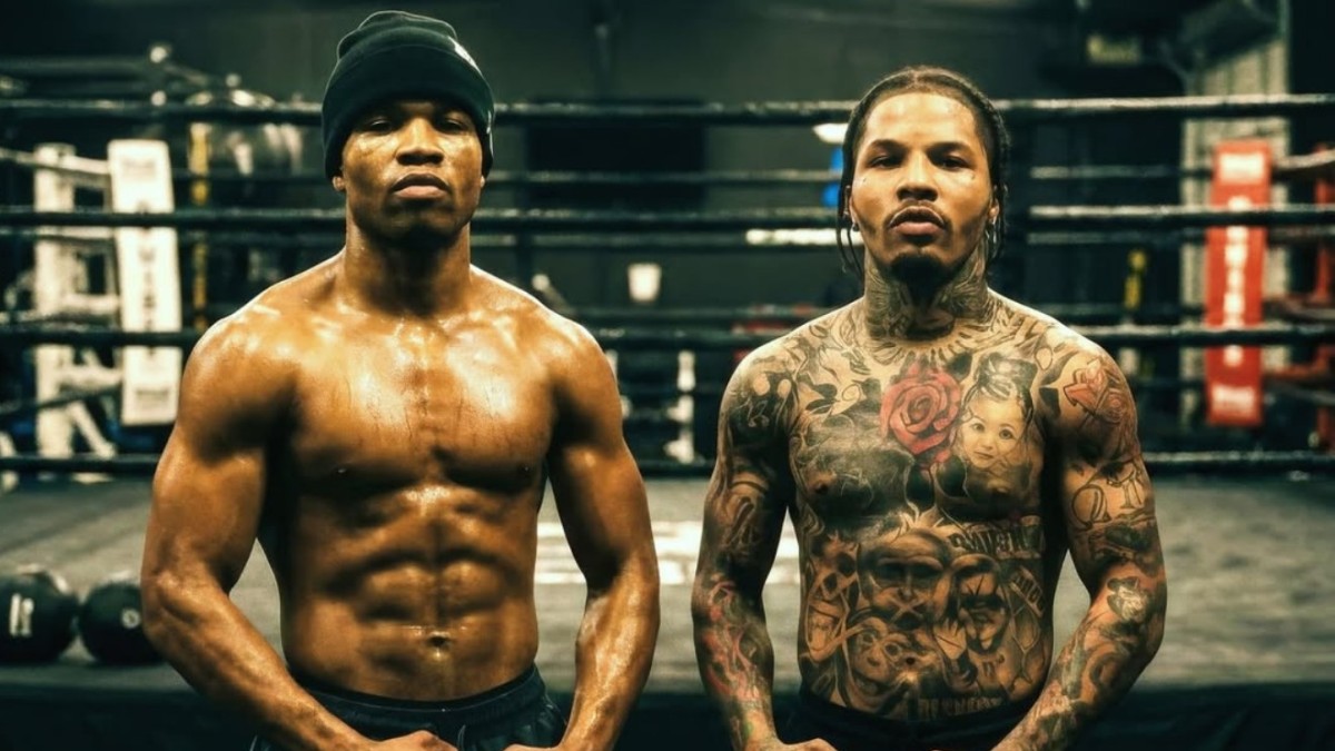 Floyd Schofield and Gervonta Davis pose in a boxing gym as negotiations continue following the WBA lightweight title order.