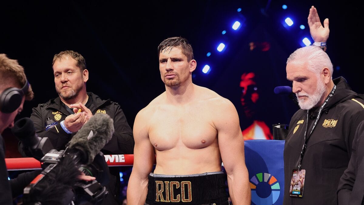 Rico Verhoeven stands in his corner before facing Oleksandr Usyk during their heavyweight title fight in Giza, Egypt