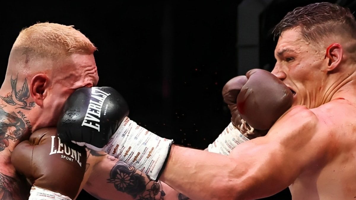 Ryan Rozicki absorbs a heavy punch from Chris Billam-Smith during their brutal cruiserweight battle in Bournemouth, England