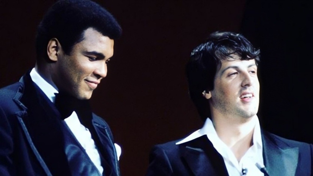 Sylvester Stallone stands beside Muhammad Ali during an Oscars appearance at the height of Rocky
