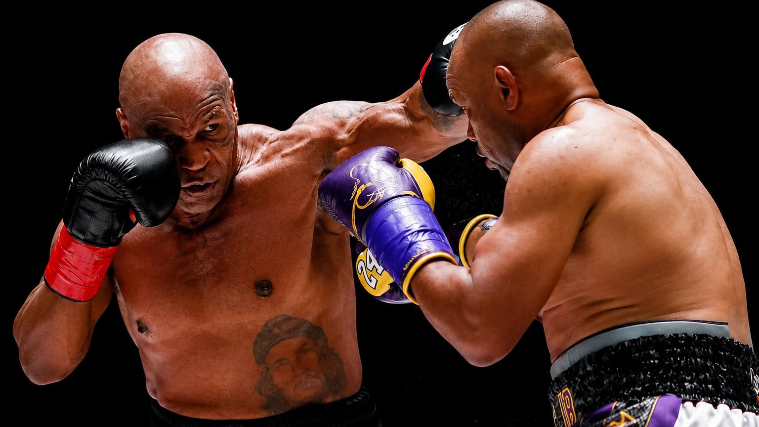 Mike Tyson lands a punch on Roy Jones Jr. during their 2020 exhibition bout that helped launch boxing