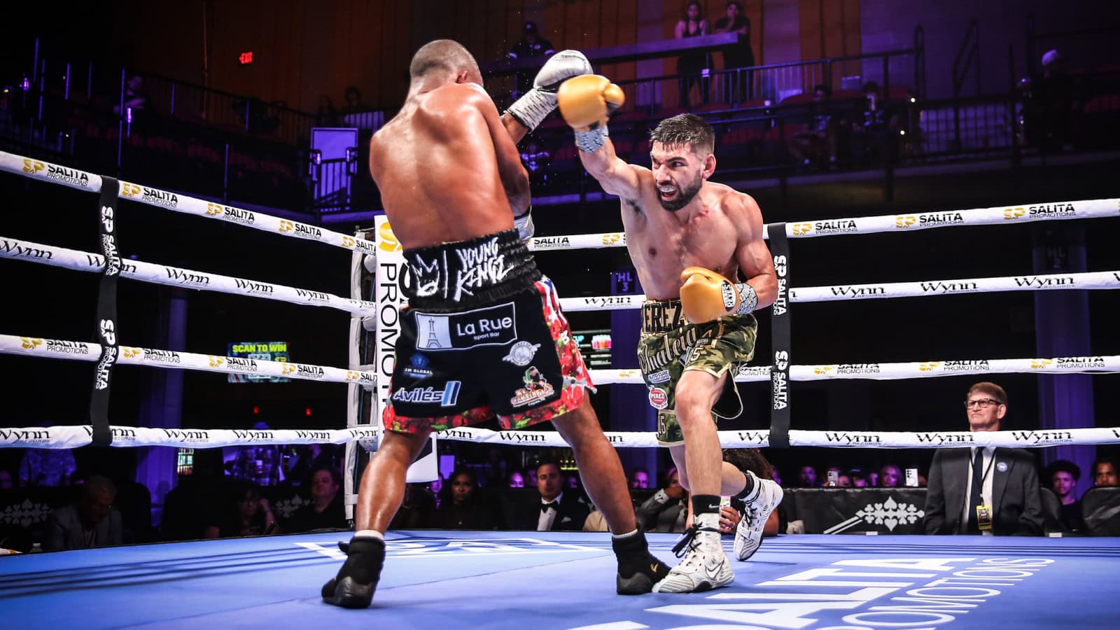 Abraham Perez attacks Jonathan Gonzalez during their WBA Interim World Flyweight Title fight in Grand Rapids, Michigan