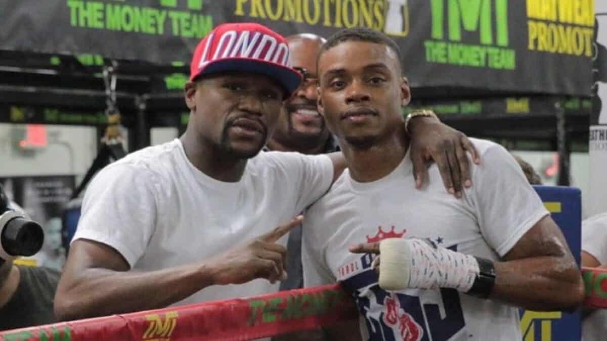 Floyd Mayweather and Errol Spence pose together at the Mayweather Boxing Club during Spence
