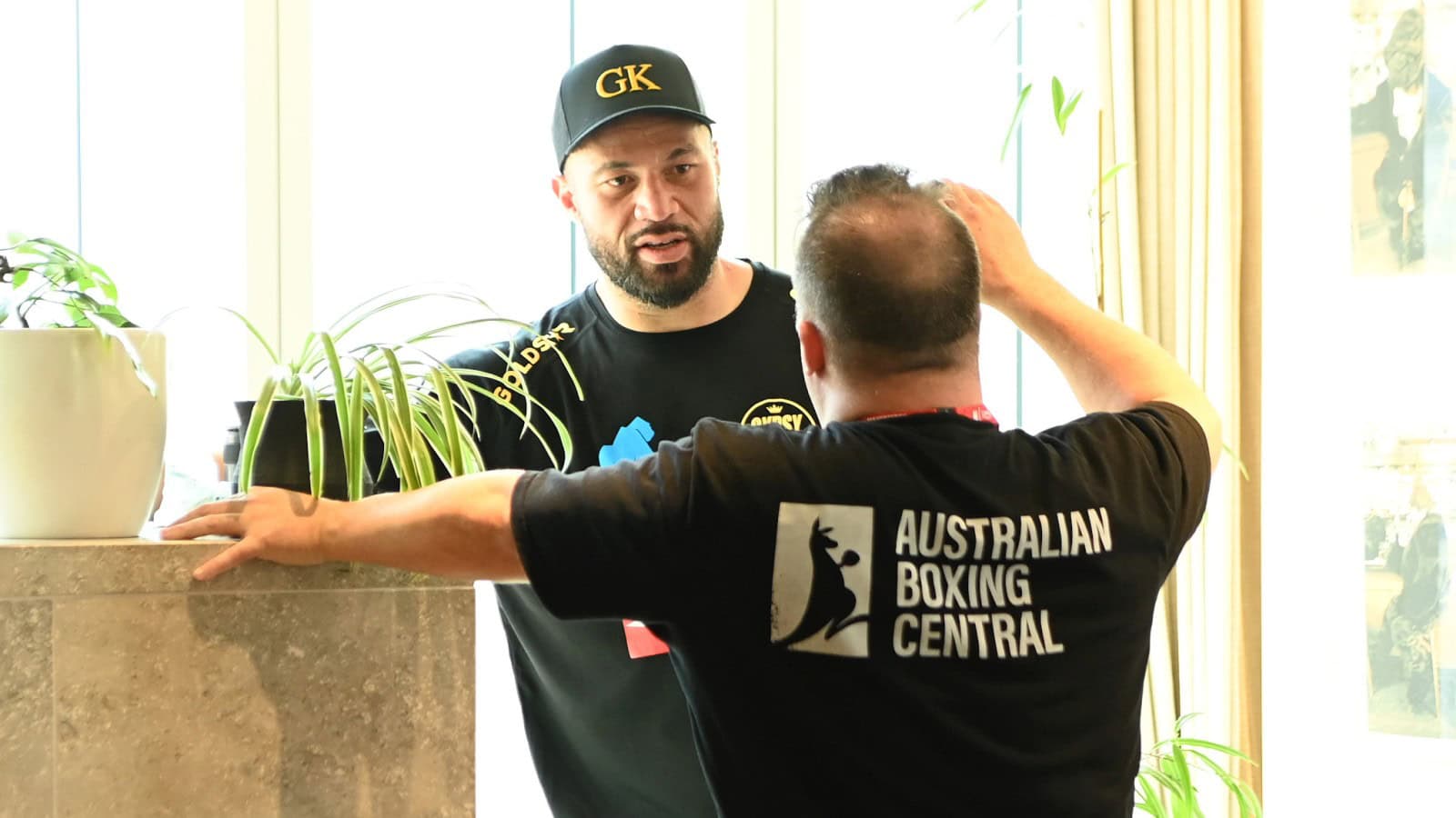 Joseph Parker speaks with an Australian Boxing Central representative during an appearance in 2026