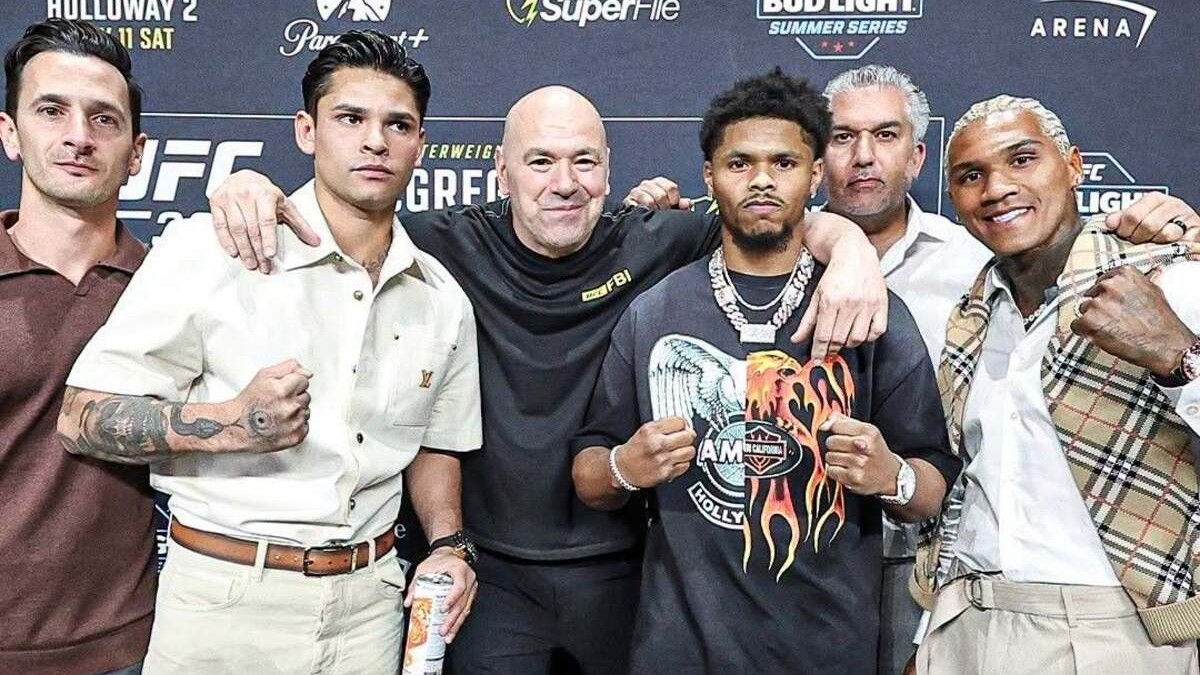 Dana White and boxing figures stand together at a combat sports event during a Zuffa Boxing announcement