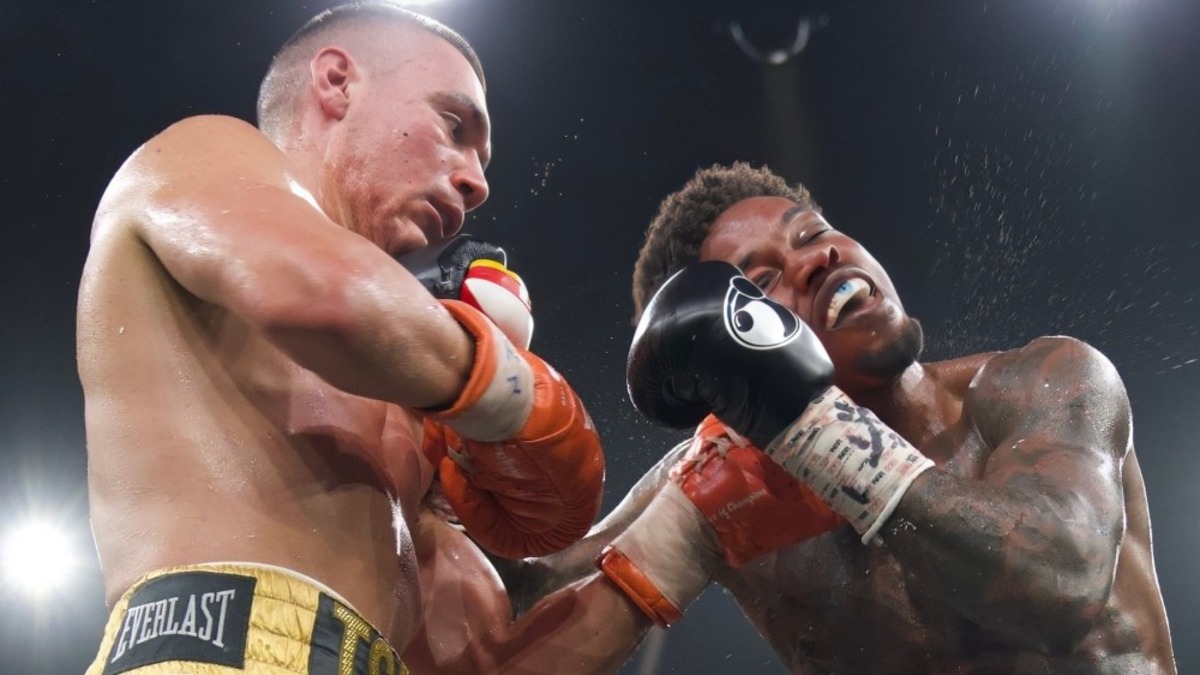 Tim Tszyu lands a right hand on Errol Spence Jr. during their middleweight bout at Afterpay Arena in Sydney, Australia