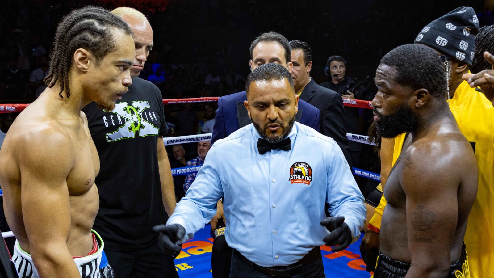 Blair Cobbs and Adrien Broner receive final instructions from the referee before their 2024 fight in Hollywood, Florida