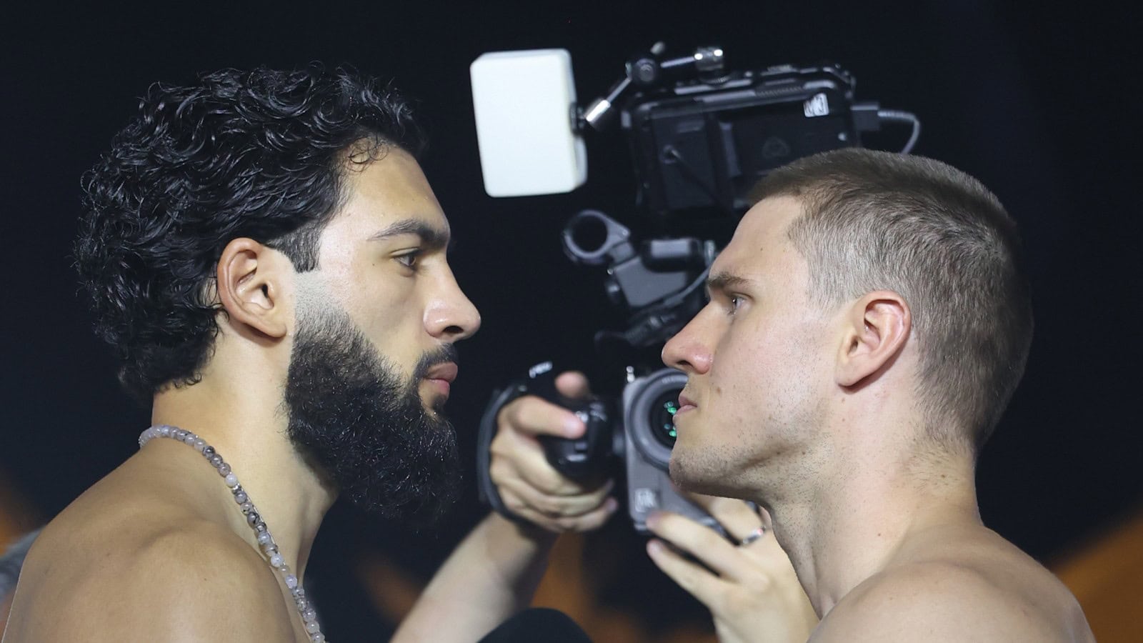Hamzah Sheeraz and Simon Zachenhuber face off during the official weigh-in before their WBO super middleweight world title fight at the Jeddah Superdome in Saudi Arabia
