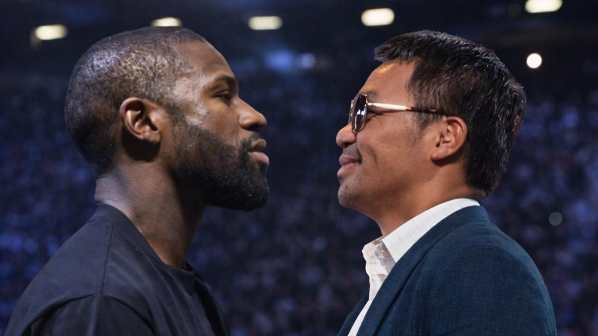 Floyd Mayweather Jr. and Manny Pacquiao face off during a promotional event as uncertainty surrounds their proposed rematch