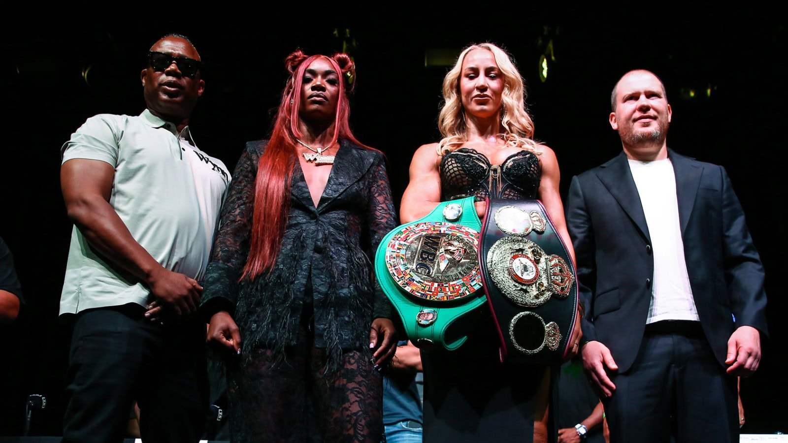 Claressa Shields and Kaye Scott pose ahead of their WBC and WBA middleweight title fight in Atlanta