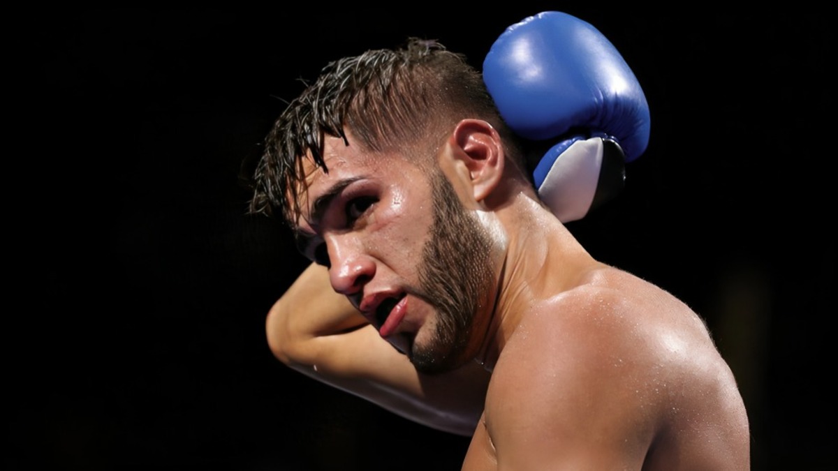 Prichard Colón takes a punch to the back of the head during his final fight against Terrel Williams