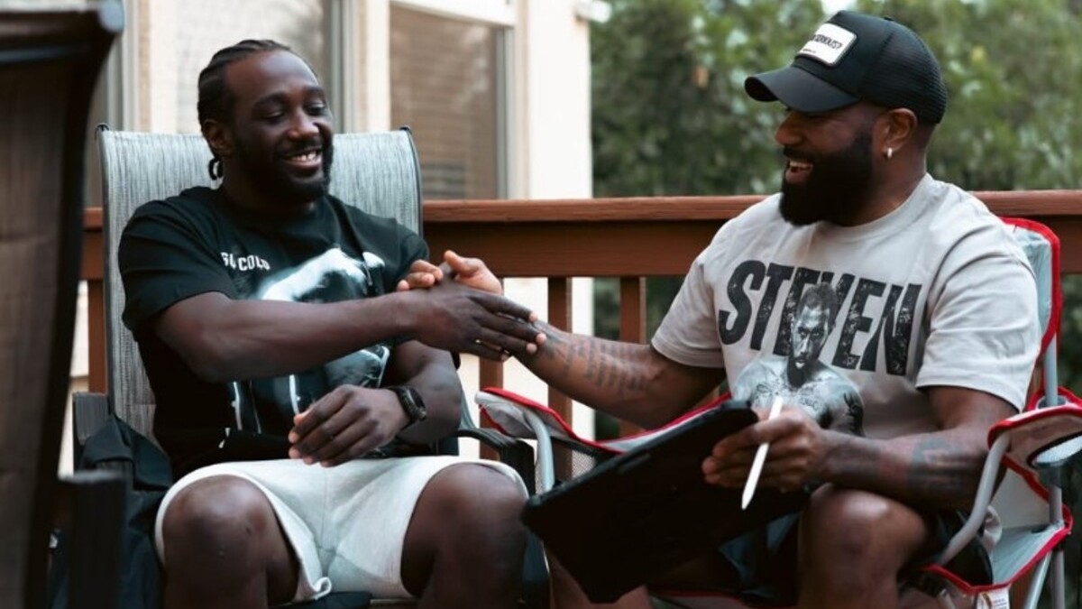 Terence Crawford shakes hands with longtime sparring partner and long-time friend Steven Nelson in Omaha