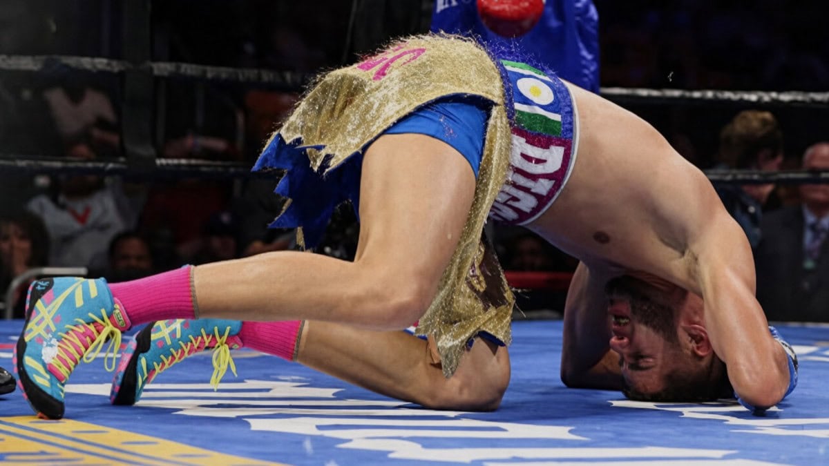 Prichard Colón on his knees in the ring during his 2015 fight against Terrel Williams