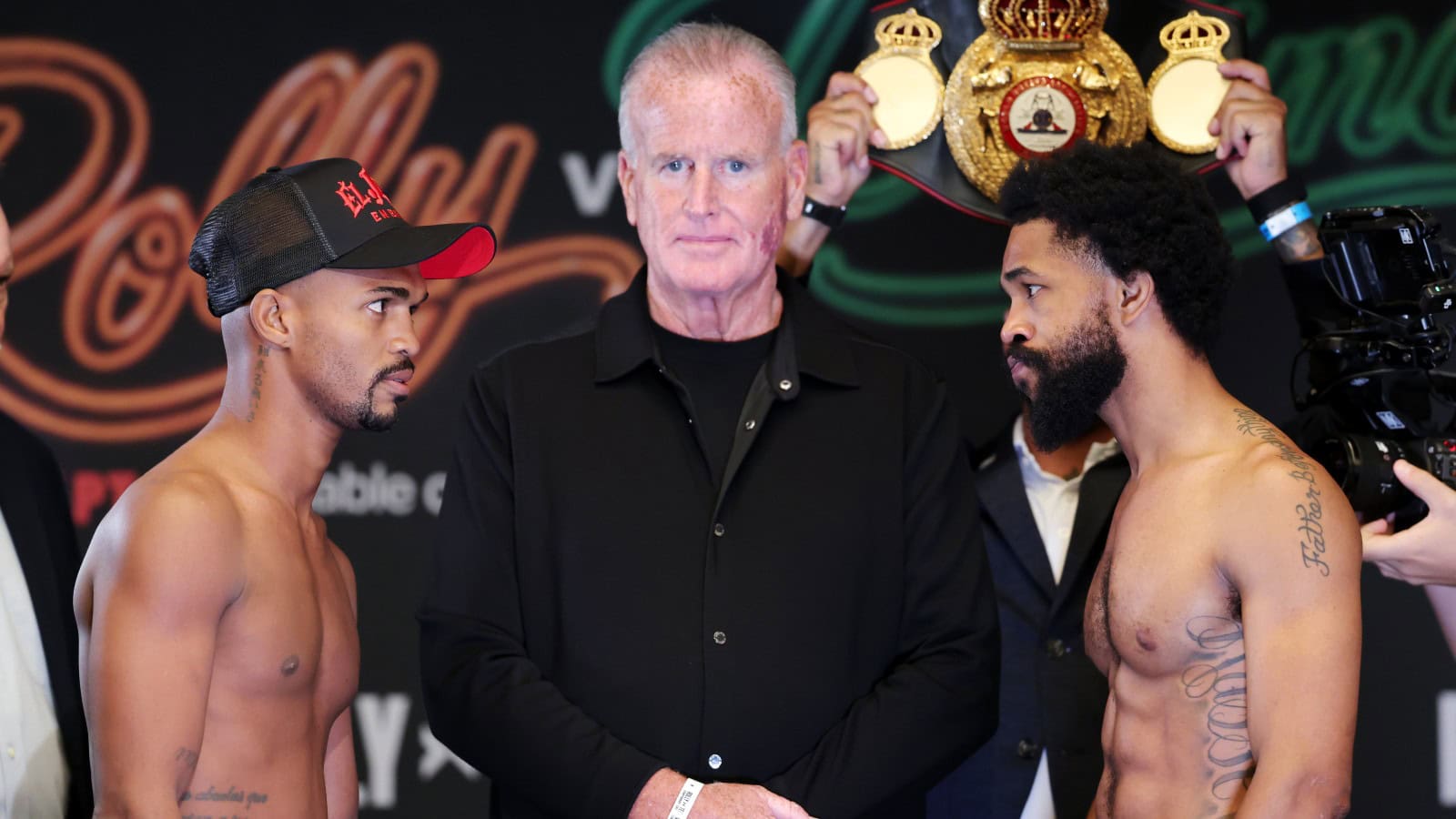 Victor Santillan and Gary Antonio Russell face off at the weigh-in ahead of their super bantamweight fight at T-Mobile Arena in Las Vegas