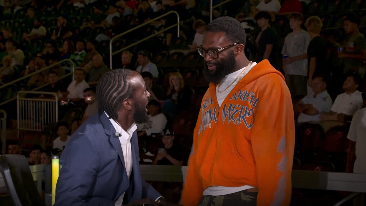 Jaron Ennis speaks face-to-face with Terence Crawford during their heated exchange