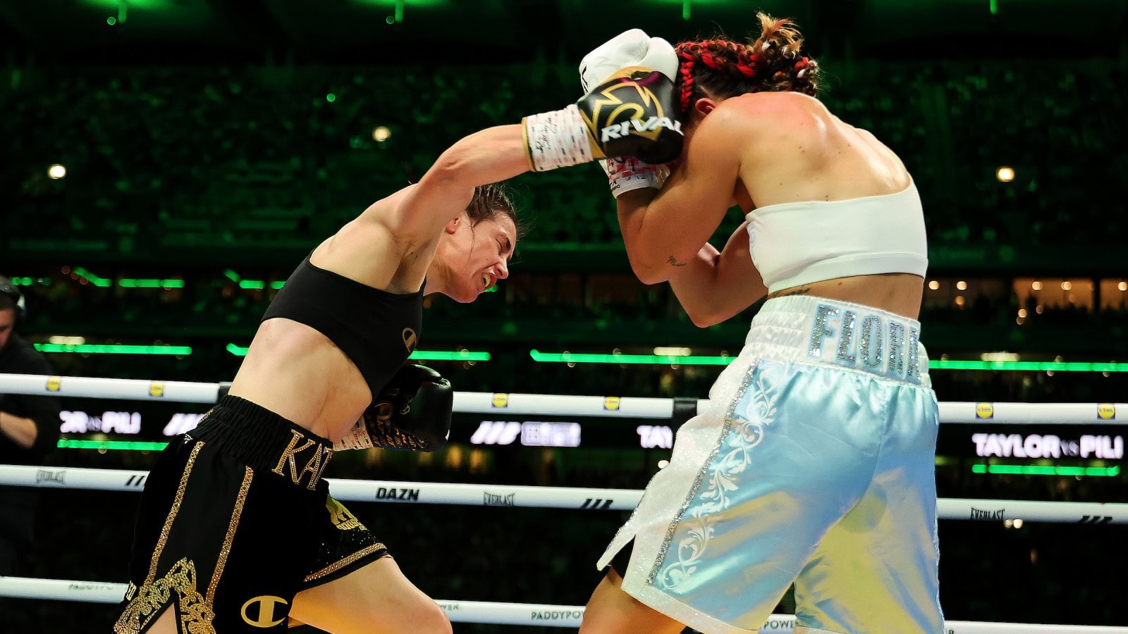Katie Taylor lands a punch on Flora Pili during her final fight at Croke Park