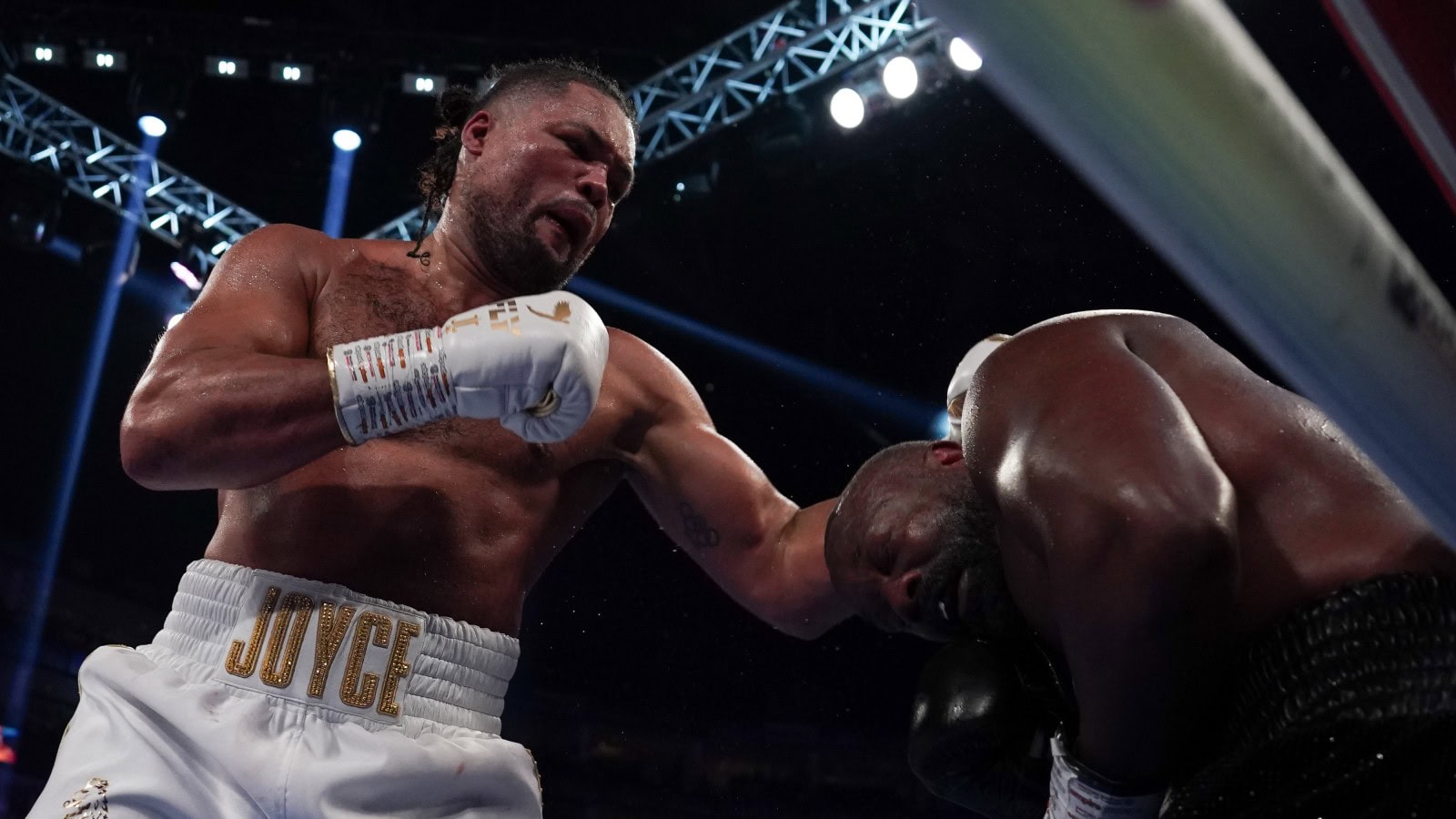 Joe Joyce absorbs punishment against Derek Chisora during their heavyweight fight