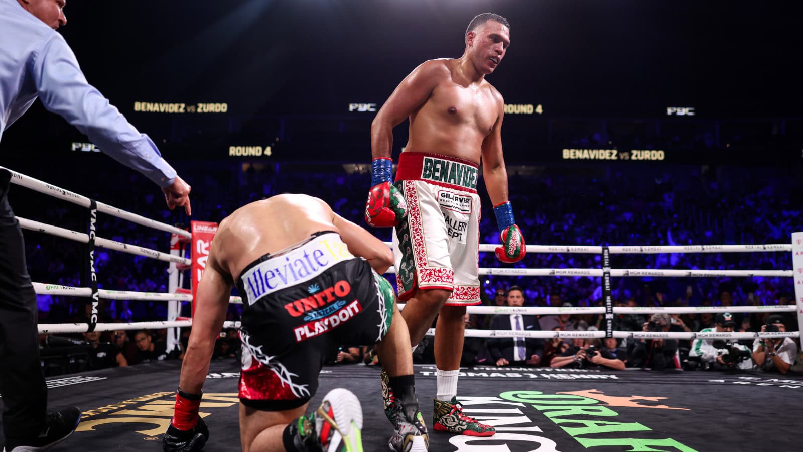 David Benavidez stands over Gilberto Ramirez during their cruiserweight title fight