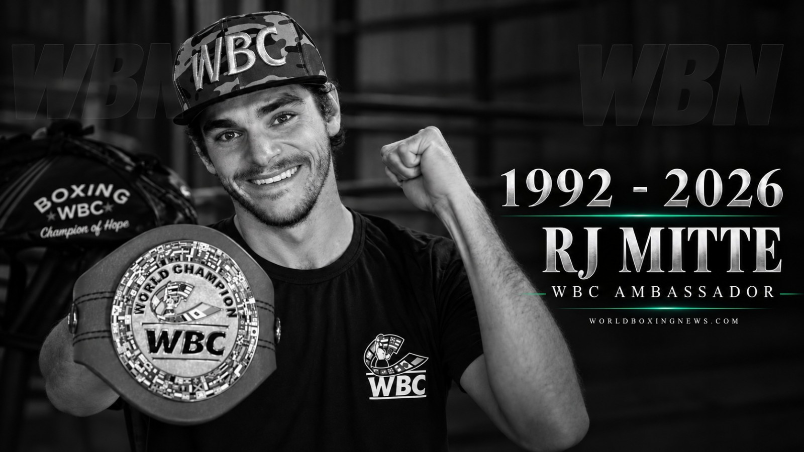 RJ Mitte, Breaking Bad actor and WBC ambassador, pictured holding a WBC championship belt in a black-and-white memorial tribute marking 1992–2026
