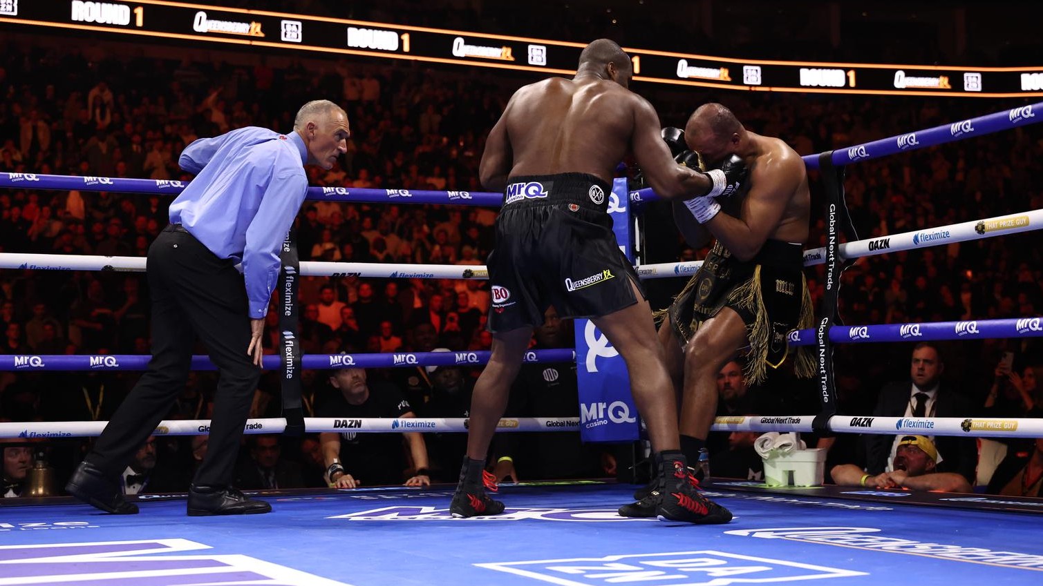 Daniel Dubois traps Fabio Wardley against the ropes during their WBO heavyweight title rematch at London