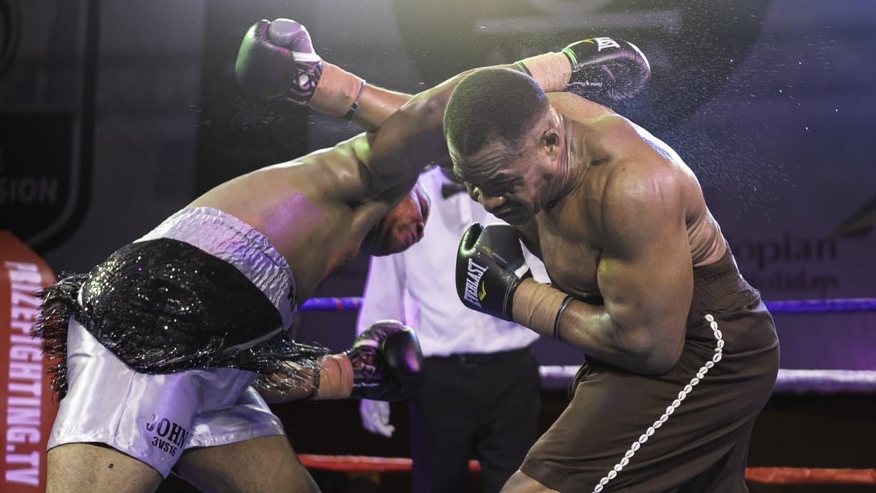 Ike Ibeabuchi throws a punch during his heavyweight boxing comeback in Nigeria in August 2025 after 26 years away from the ring